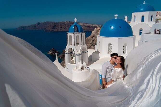 Flying Dress Photoshoot in Oia Private entry to Blue Dome - Meeting Point and How to Plan Your Arrival