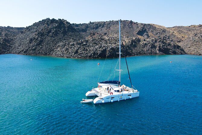 Full Day Santorini Catamaran Private Cruise with meal and transfer - Food, drinks, and that sunset moment on the water