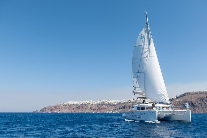 Premium Santorini Private Day Tour Elba 45, BBQ, drinks, transfer - From your hotel to Ammoudi port: the part that makes the day easier
