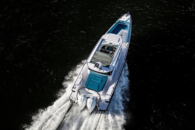 Private Axopar 37 MotorYacht Cruise in Santorini w/ Snack & Drink - Swim, Snorkel, and Lunch on a Small Island