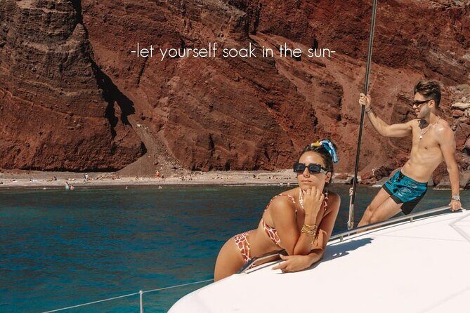 Private Sunset Cruise with Full Greek Dinner - The volcano side and the hot springs swim at Palia Kammeni