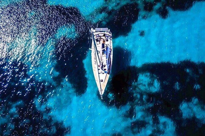 Sailsational Luxury Santorini Catamaran Sunset Cruise with Dinner - Red Beach and White Beach: Volcanic Color from Sea Level