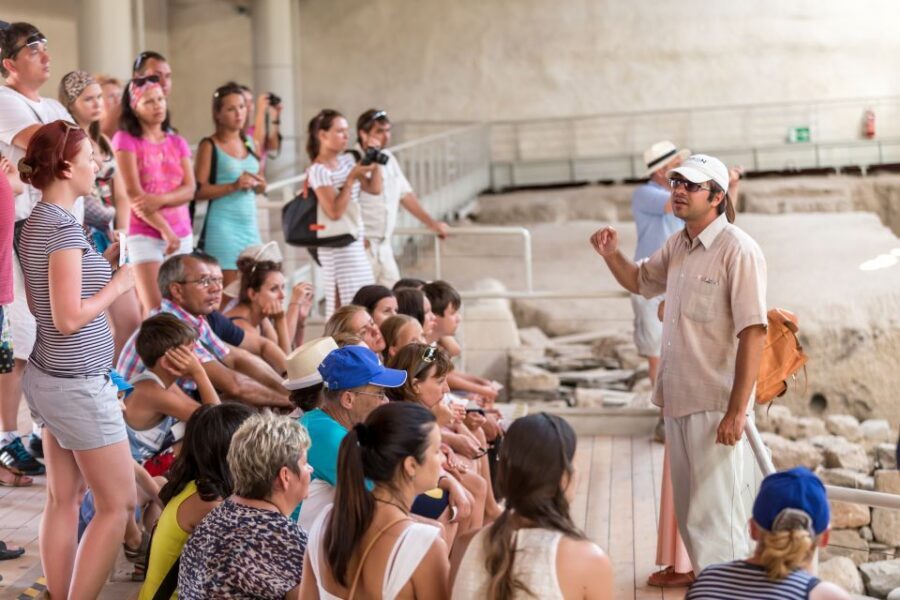 Santorini: Akrotiri Prehistoric City Guided Walking Tour - Entering the excavation site: meeting, tickets, and pacing
