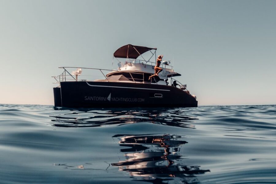 Santorini: Caldera Private Power Catamaran Cruise - What You Get on Board: Open Bar, BBQ, and Greek Meze