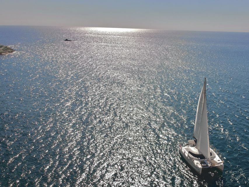 Santorini: Catamaran Cruise with Food and Drinks - Onboard comfort and the crew vibe (names you might hear)