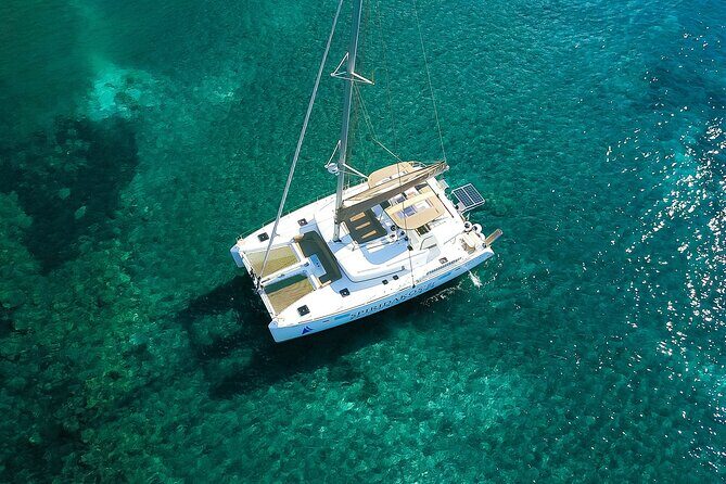 Santorini Classic Catamaran Cruise with BBQ, Drinks and Transfers - Volcano Views and the Crew Explanation: Making the Scenery Make Sense