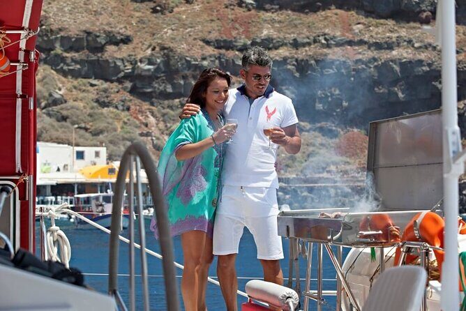 Santorini Cruise on Catamaran with BBQ & Open Bar - White Beach: limestone scenery and your BBQ lunch break