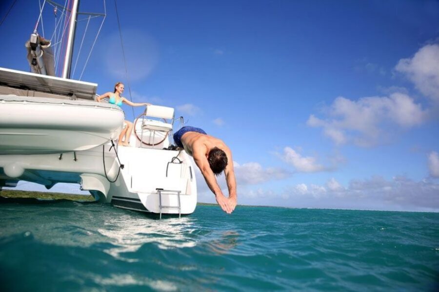 Santorini: Dream Catcher 5-hour Sailing Trip in the Caldera - BBQ lunch in a secluded bay: eating like a vacation