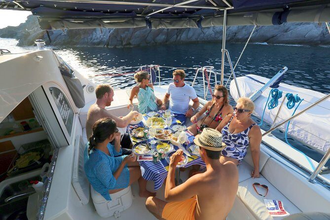 Santorini Full Day Catamaran Private Cruise incl. Meal, Drinks & Free Transport - Aspronisi and the Caldera Islands: Rocky, Remote, and Uninhabited