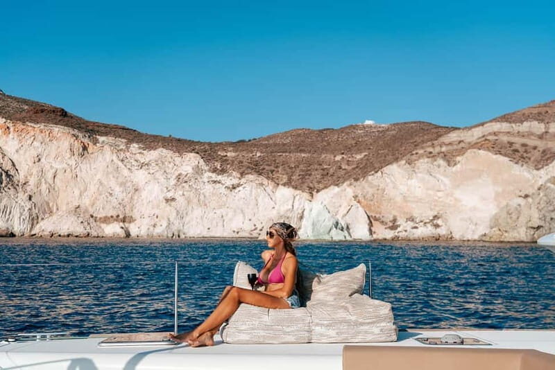 Santorini: Luxury Catamaran Cruise with Lunch, BBQ & Drinks - Cruising the Caldera Views: Red Beach, White Beach, and Akrotiri Lighthouse