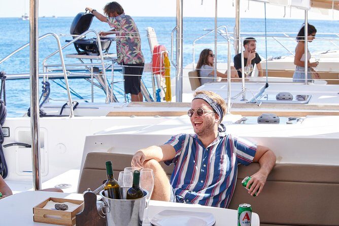Santorini Platinum Catamaran Cruise with Meal, BBQ and Open Bar - Mesa Pigadia Beach Swim: Clear Water, Snorkel Gear, and an Appetizer Pause