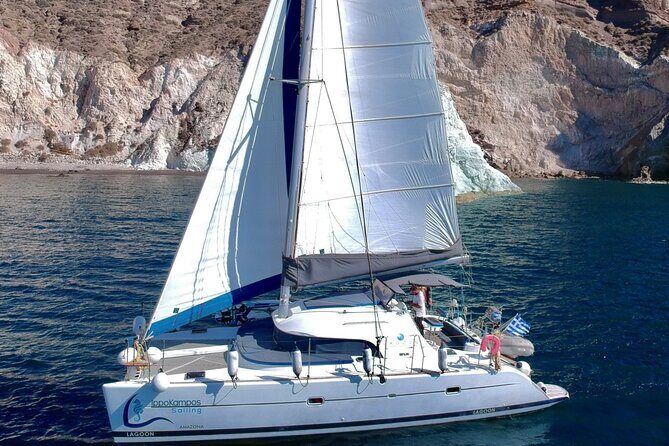 Santorini: Private All-In Catamaran Cruise (Food&Drinks) - Red Beach and White Beach: quick swim time with photo-perfect scenery