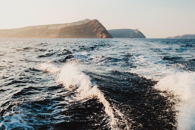 Santorini Private Catamaran Cruise with BBQ, Open Bar & Transfers - Indian Rocks and the caldera pass: the sea-level views you came for