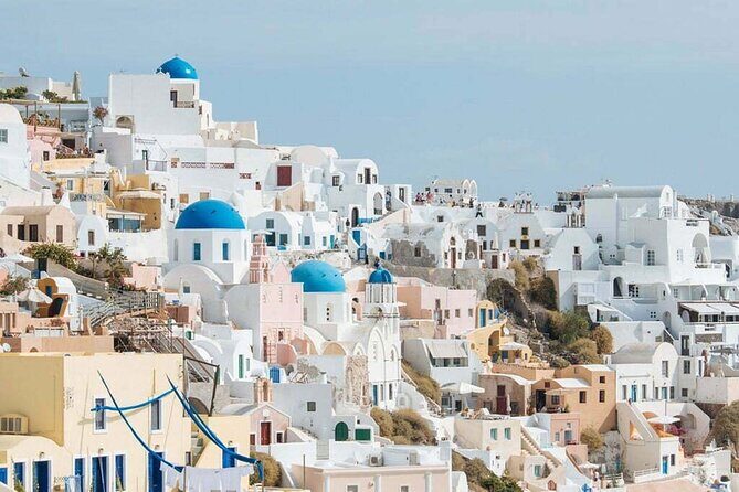 Santorini Private Half-Day Sightseeing Tour - Oia’s Main Street: blue-domed icons, bells, and sunset energy