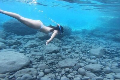 Santorini: Stand-Up Paddle and Snorkel Adventure - SUP lessons with real coastline views, not a classroom